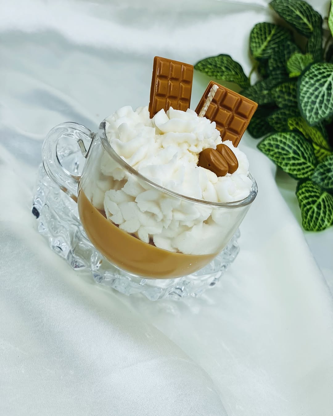 Indulge in the comforting aroma of freshly brewed coffee swirled with rich, velvety whipped cream. This candle captures the perfect balance of robust espresso notes blended with a touch of sweetness, evoking the cozy ambiance of your favorite cafe.